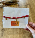 Collier ras de cou en tissu - croix